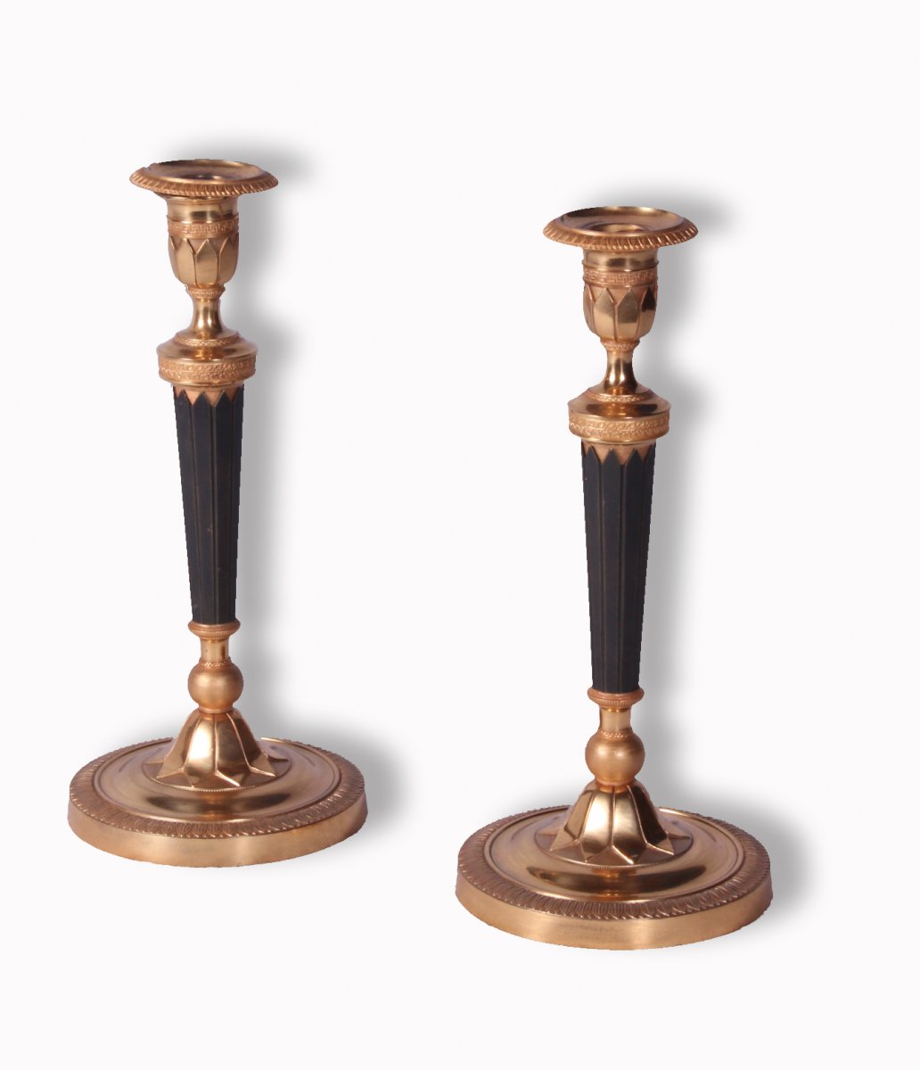 A Pair Of  Empire  Gilt Bronze Candlesticks.