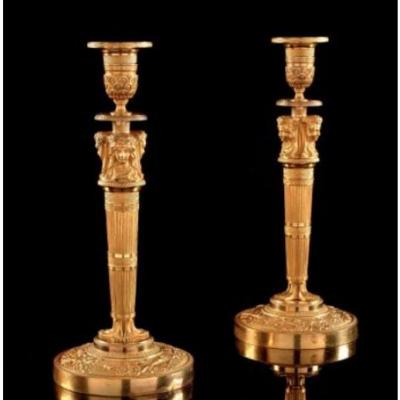 A Pair Of Empire Gilt Bronze Candlesticks