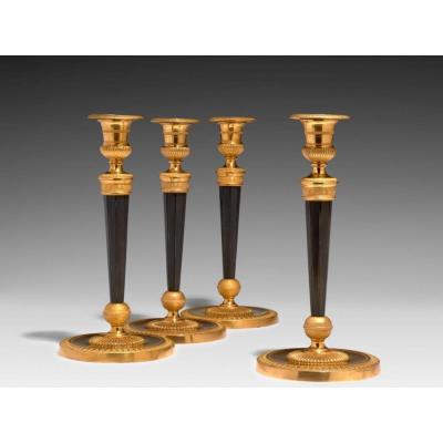 A Set Of Four Empire Gilt And Patinated Bronze Candelsticks, After The Model By Antoine Andre R