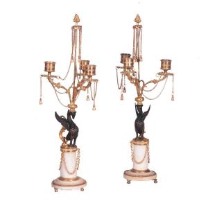 A  Louis XVI Gilt Bronze Pair Of  Candelabra