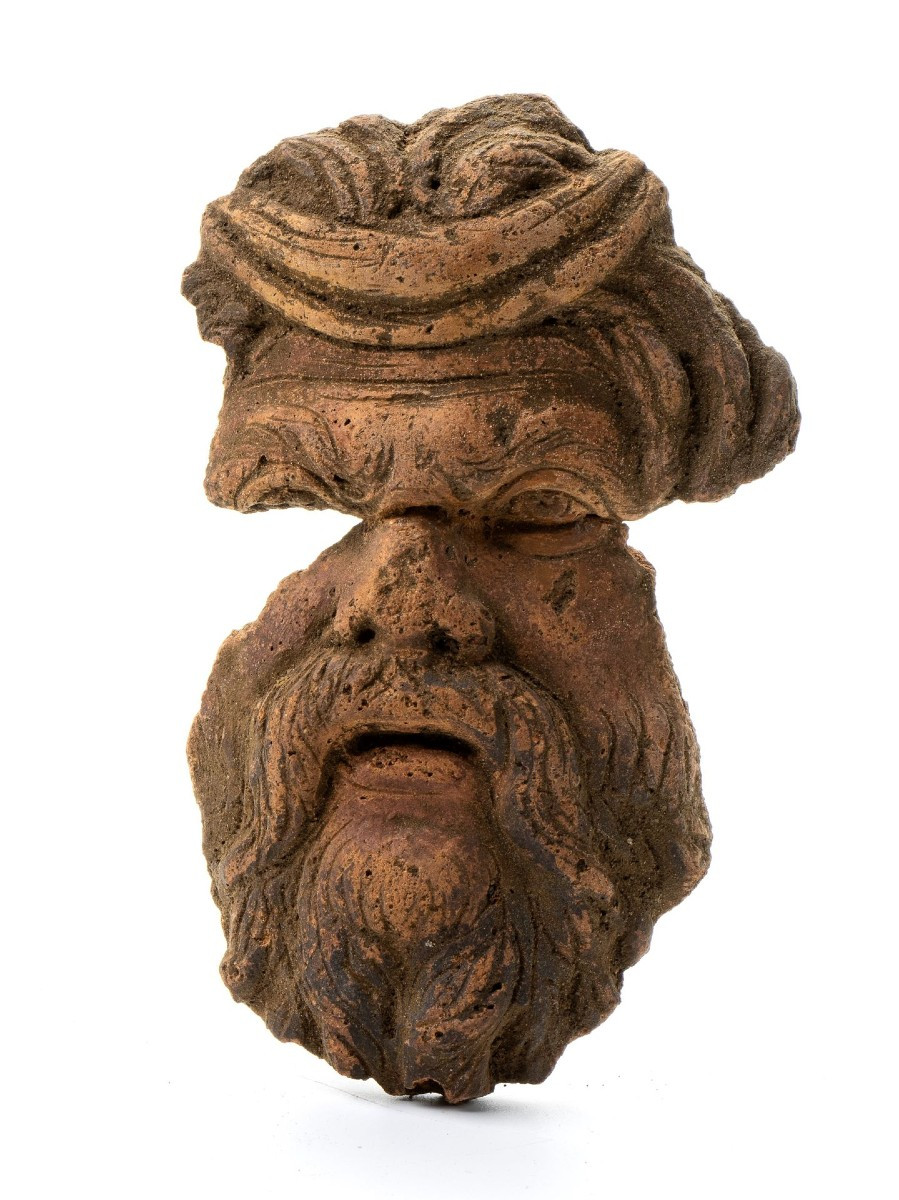Fragment Of A Terracotta Mask Inspired By Classical Antiquity.