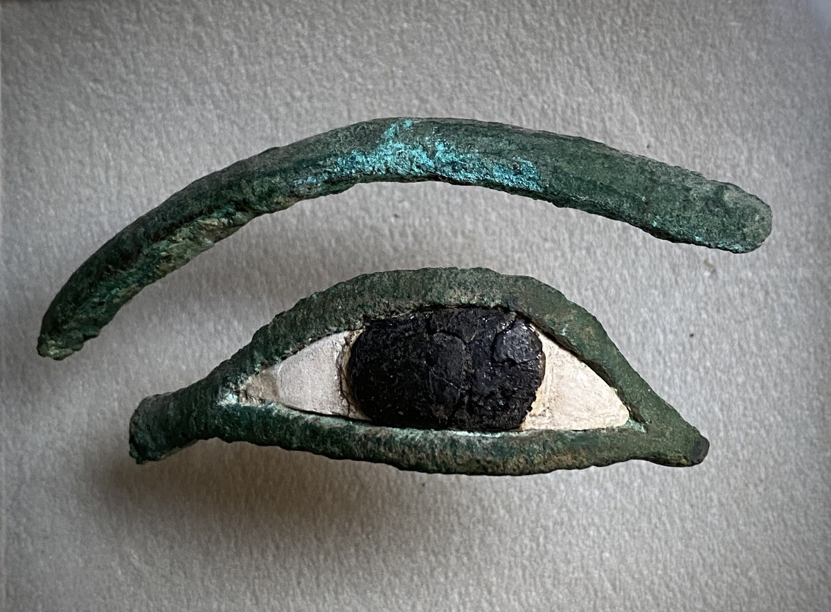 Eye Inlaid With An Egyptian Sarcophagus Mask, Bronze And Stone, Ancient Egypt