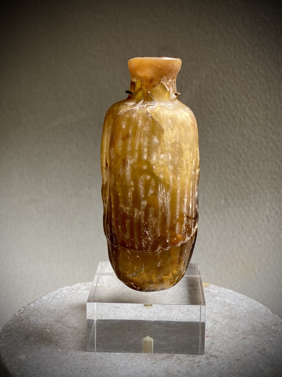 Falcon en verre ambré romain antique en forme de datte ,  dit « DATE FLASK » , orient romain 