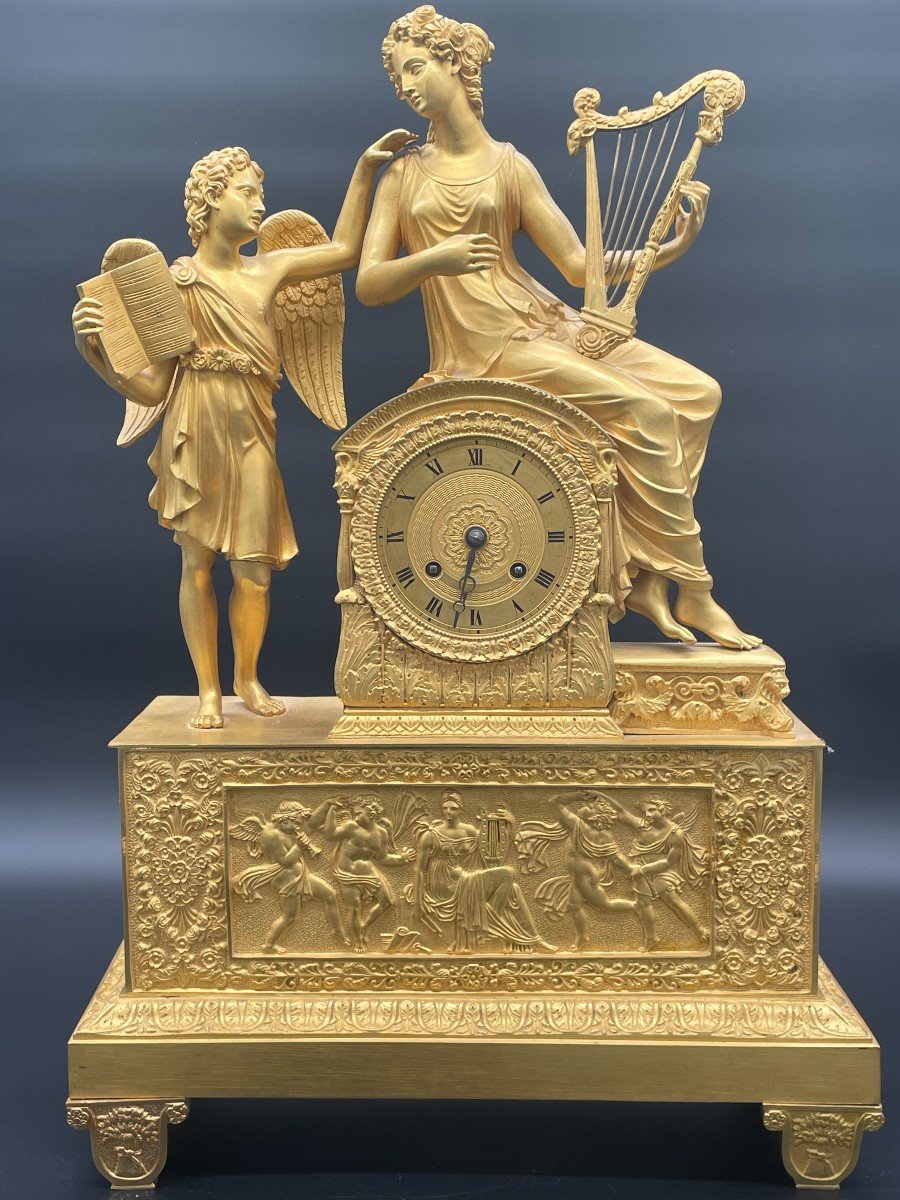 Grande pendule en bronze ciselé et doré à l'or "Psyché et l'Amour " vers 1820