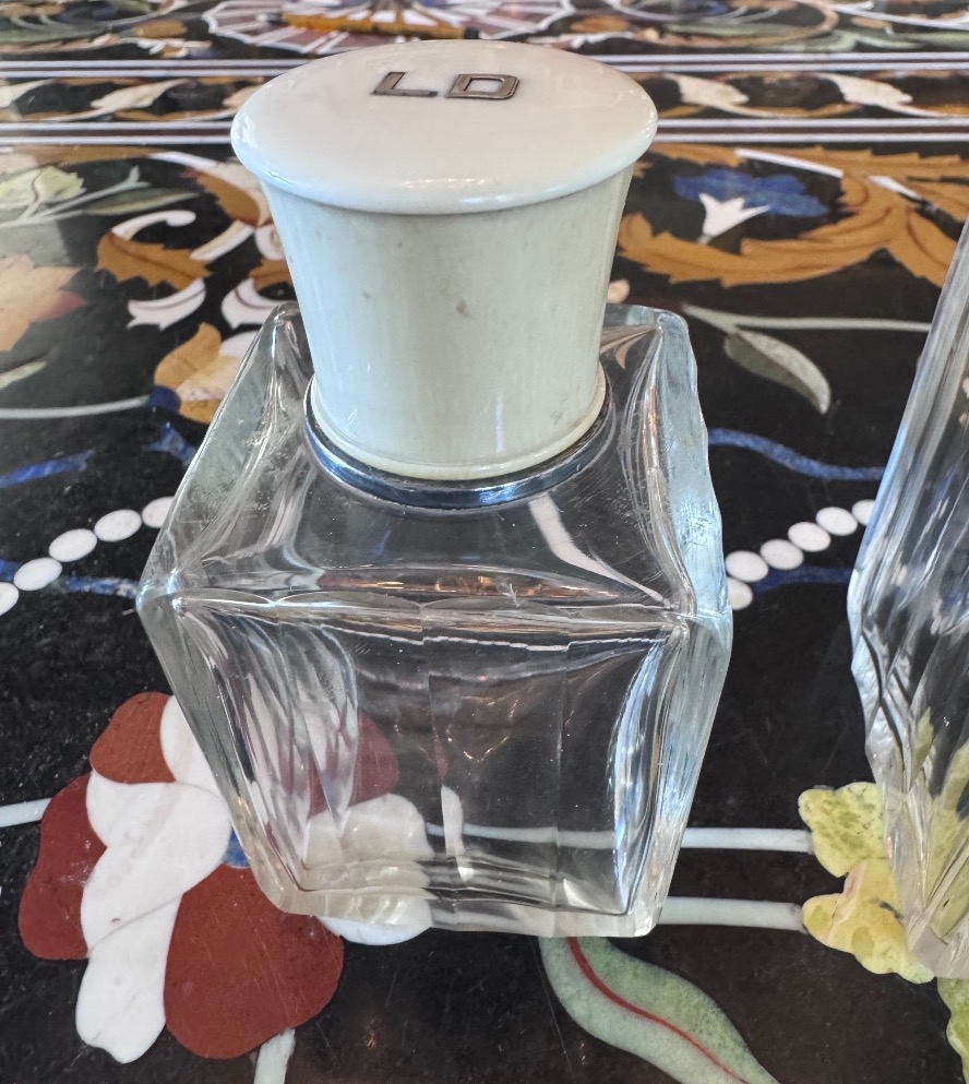 A Set Of Three Perfume Bottles In Crystal, Silver, And Ivory.-photo-3