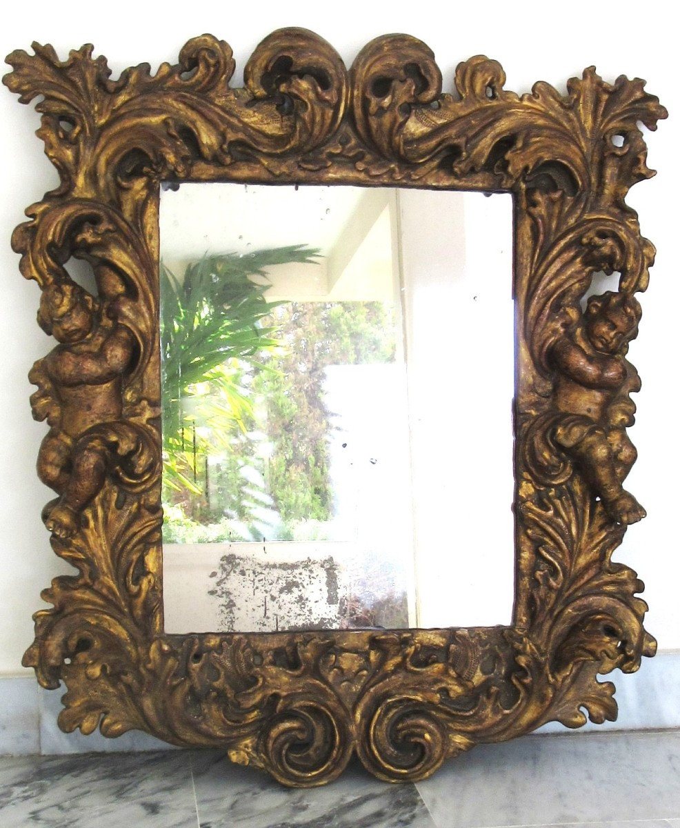 Miroir en bois doré à décor de Putti Ep.17ème