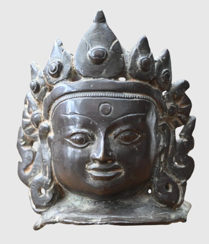 Tête de divinité bouddhique en bronze, époque Ming