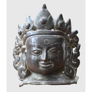 Tête de divinité bouddhique en bronze, époque Ming