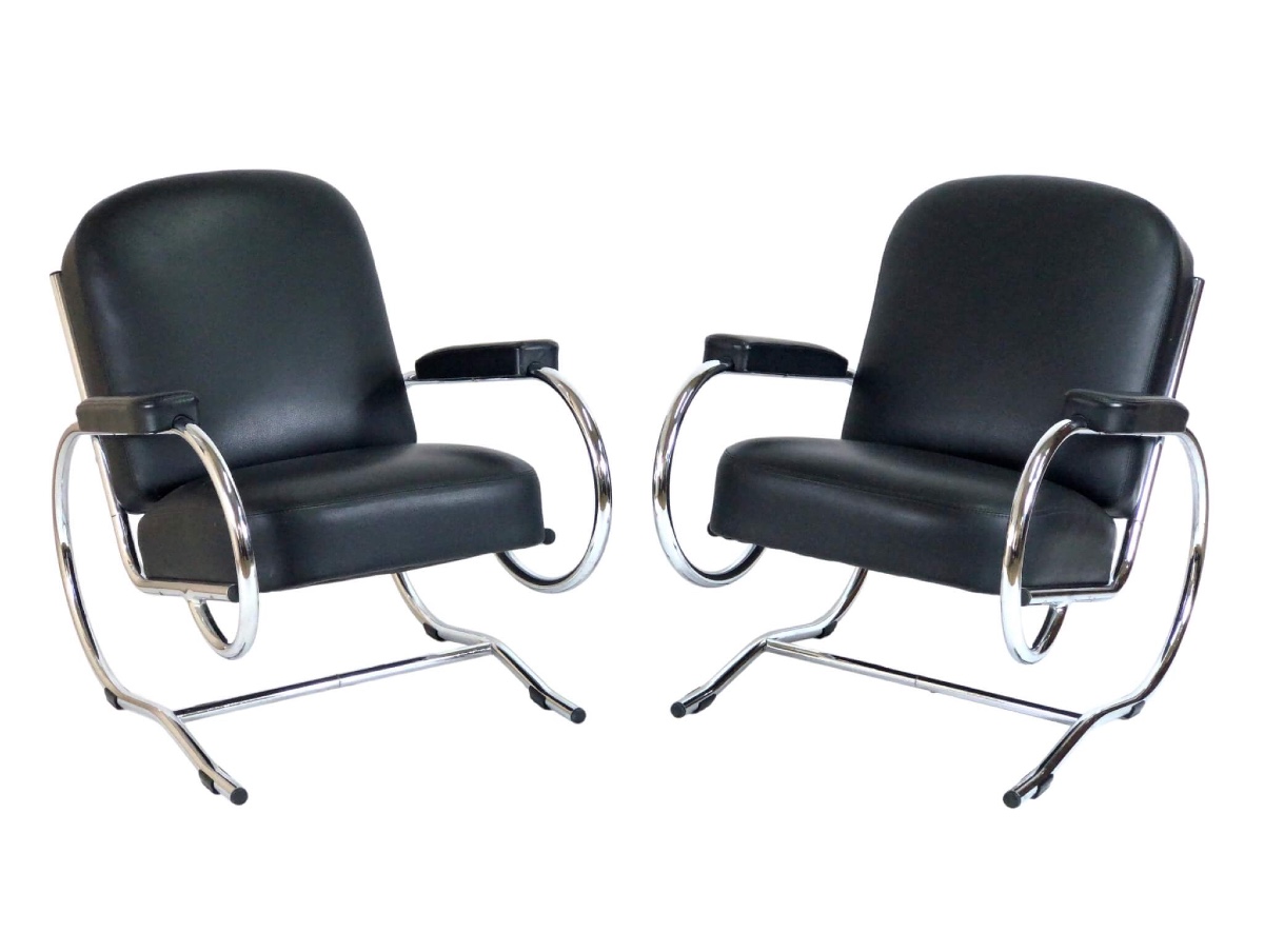 Paire de fauteuils du milieu du siècle avec tubes d'acier courbés