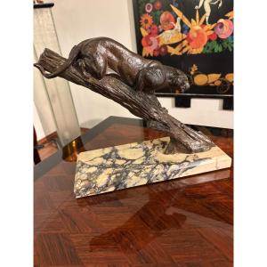 Panthère en bronze sur un tronc d´arbre, Art Déco, années 1920, signée Rochard