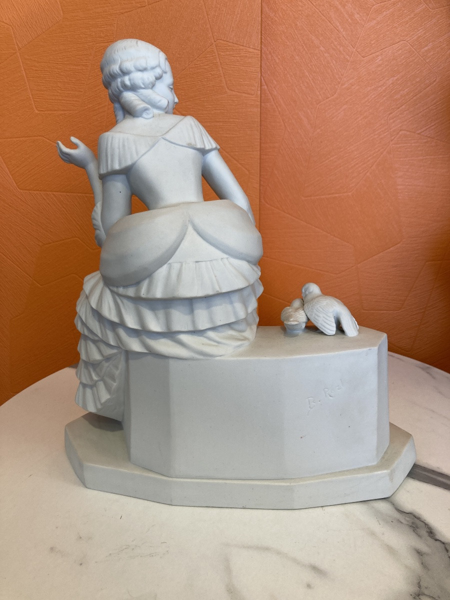 Woman With Biscuit Doves -photo-1