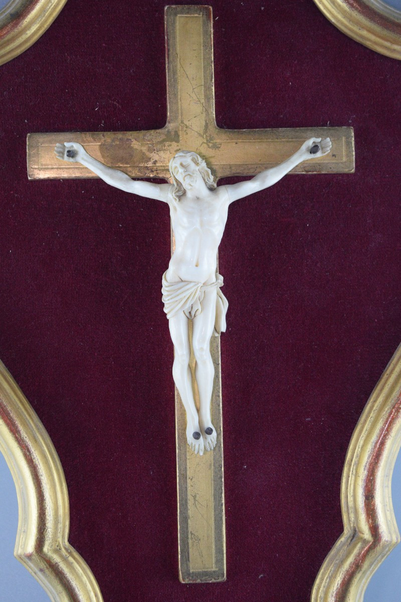 Ivory Crucifix On Velvet Background-photo-2