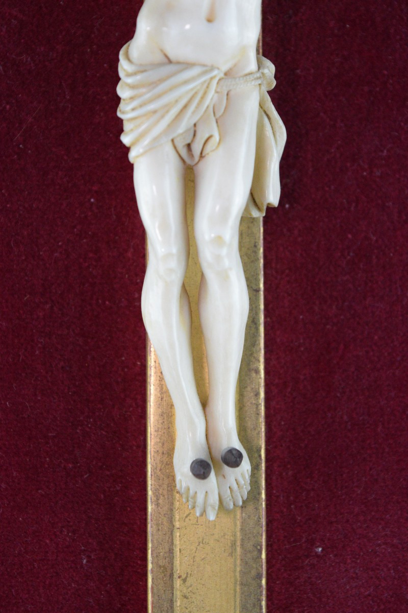 Ivory Crucifix On Velvet Background-photo-1