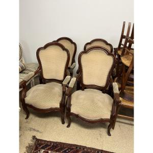 Suite de 4 fauteuils 19 éme siècle en acajou