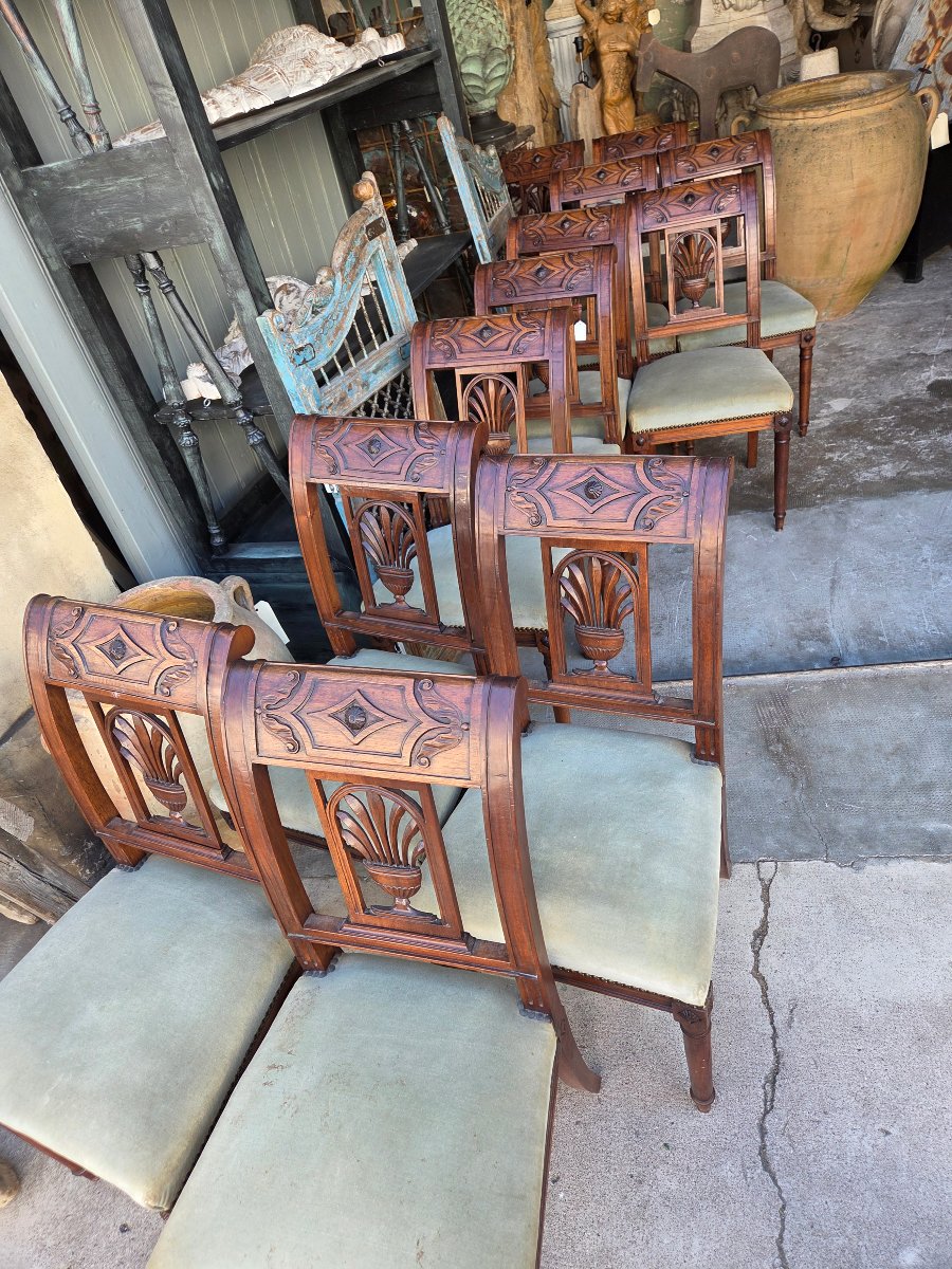 Serie de 12 chaises en noyer époque Empire