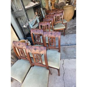 Serie de 12 chaises en noyer époque Empire