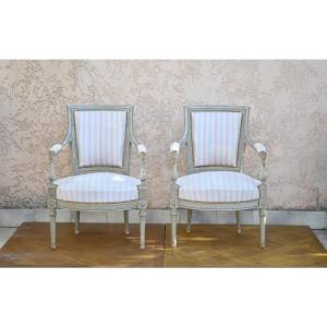 Paire de fauteuils patinés directoire 