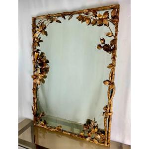 Miroir italien milieu XXeme à décor de branchages feuillages et fleurs 