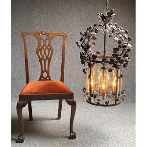 Lustre en forme de  grande lanterne fer patine bronze vieil or décor de fleurs et feuillages 