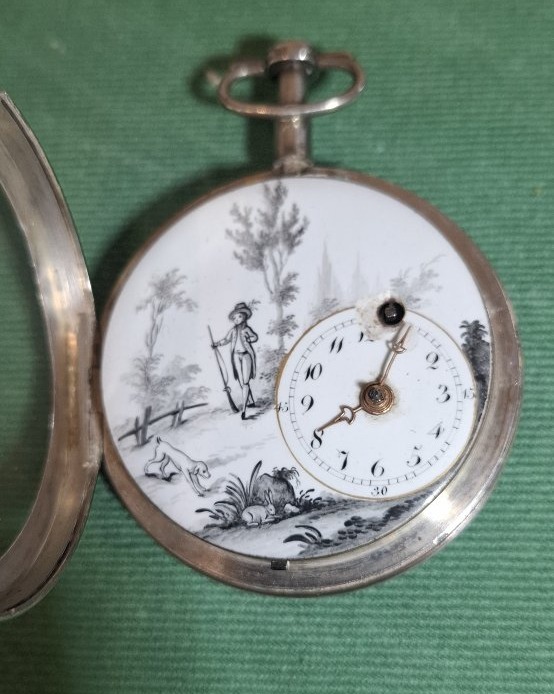 Montre de poche en argent , cadran décentré et émail peint 