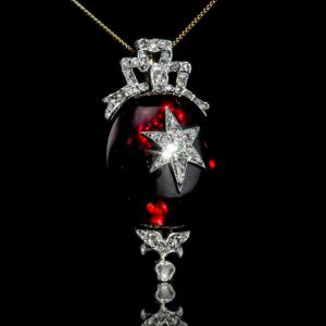 Broche / pendentif ancien or 14 carats, grenat cabochon diamants motif étoile – vers 1870