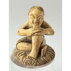 netsuke représentant un insulaire des iles du sud