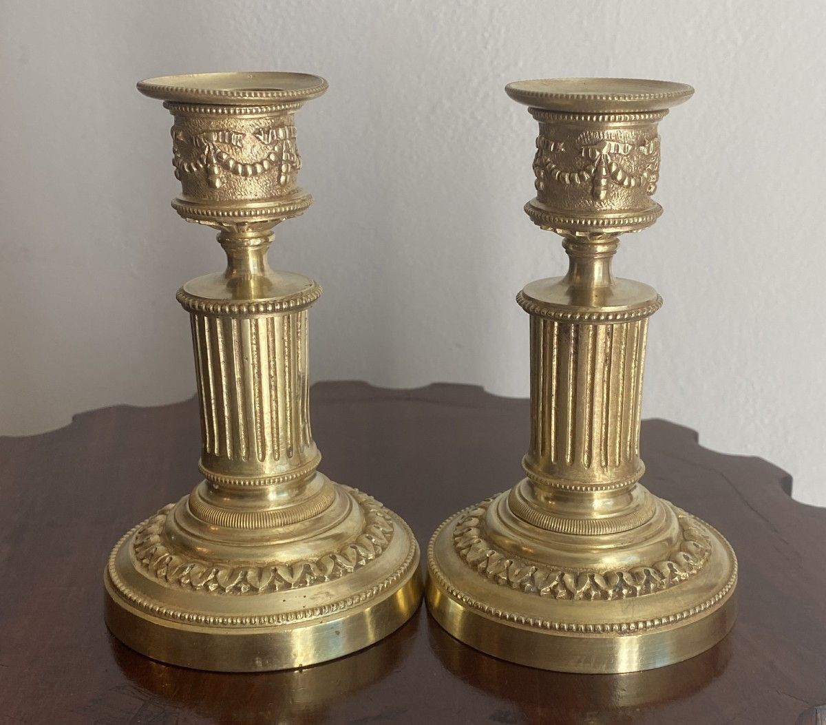 Pair Of Lxvi Style Candlesticks Or Table Ends In Chiseled Gilt Bronze From The 19th Century