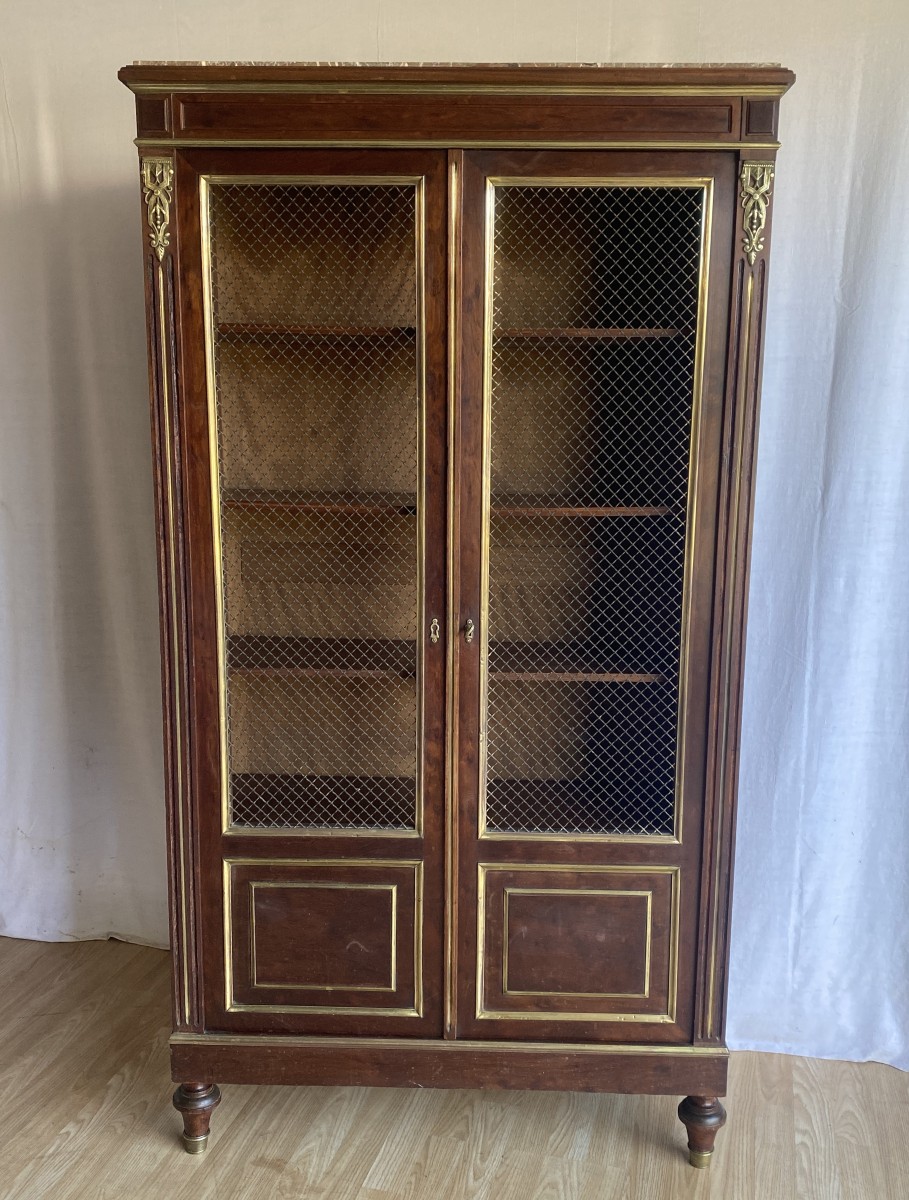 Bibliothèque grillagée de style Louis XVI en acajou XIX ème