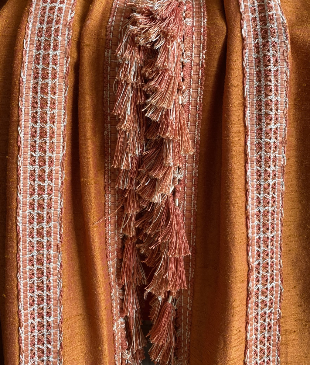 Pair Of Orange Curtains With Raspberry-colored Highlights -photo-3