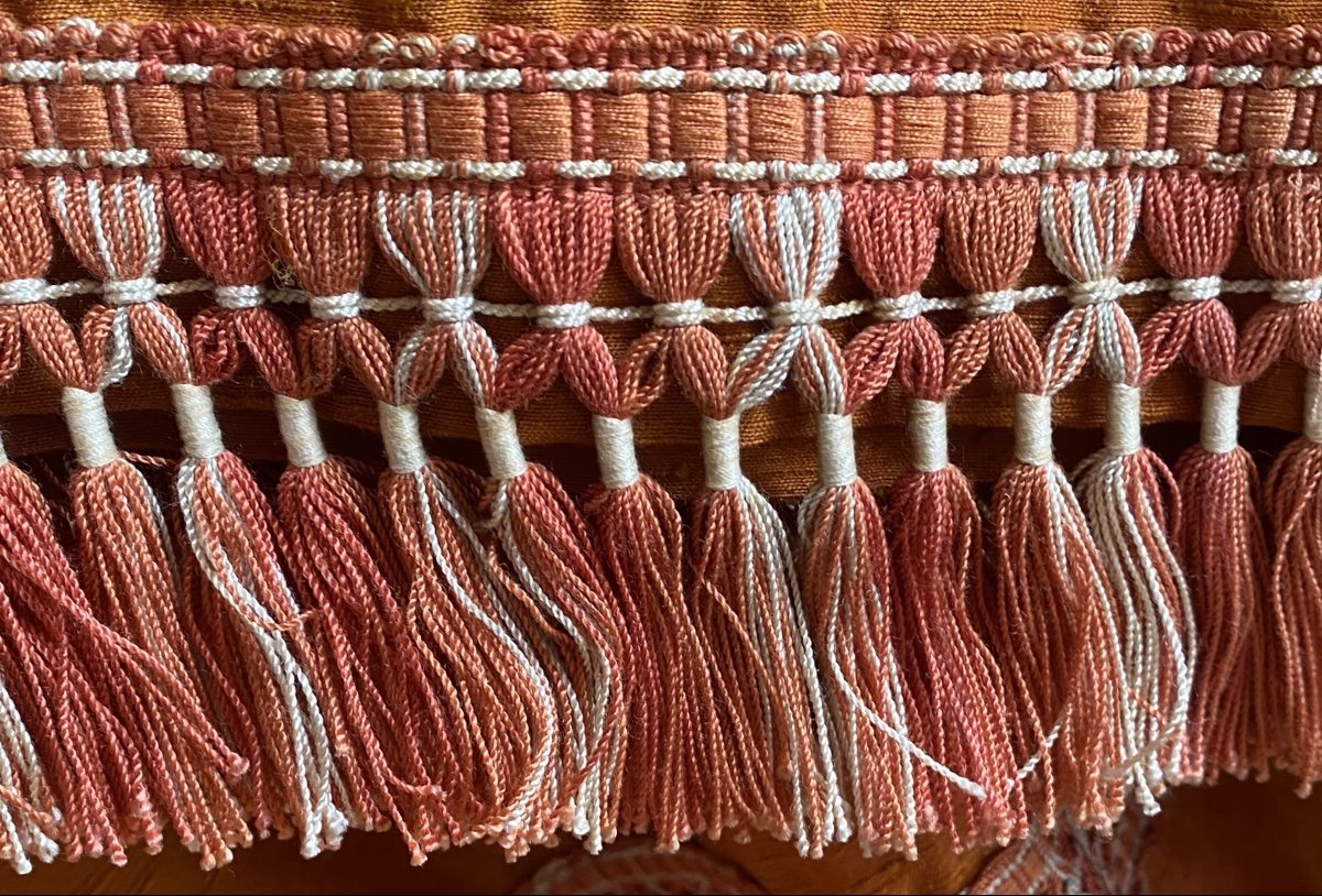 Pair Of Orange Curtains With Raspberry-colored Highlights -photo-2