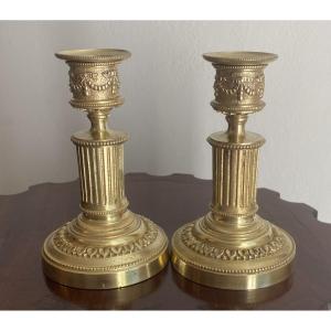 Pair Of Lxvi Style Candlesticks Or Table Ends In Chiseled Gilt Bronze From The 19th Century