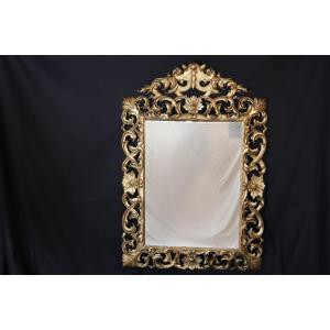 Miroir italien en bois doré XIXe