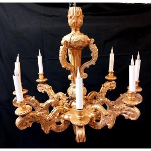 grand lustre en bois sculpté doré à la feuille