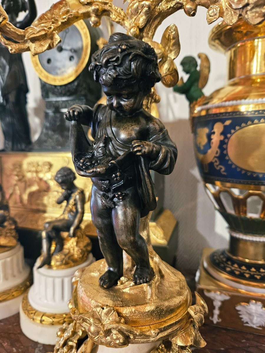 Paire de candélabres aux "putti"en bronze doré XIXème-photo-4