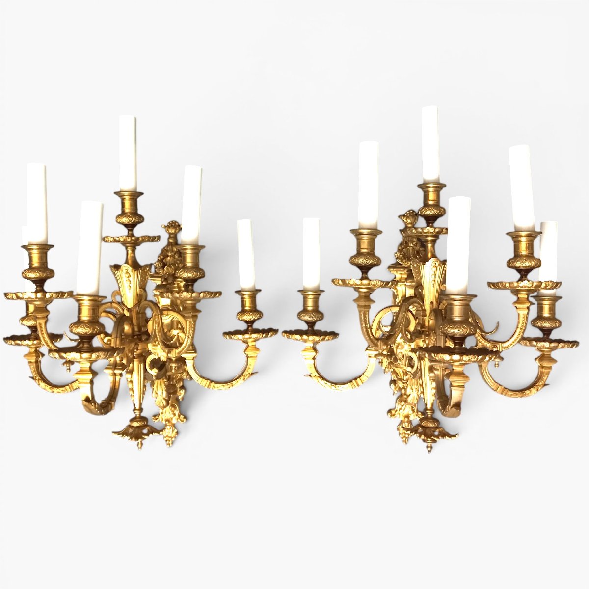 A Significant Pair Of Chiseled And Gilded Bronze Wall Sconces