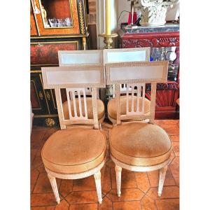 Suite de 4 chaises sculptées et laquées st Directoire 