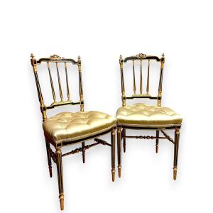 Paire de chaises capitonnées en bois doré style Louis XVI