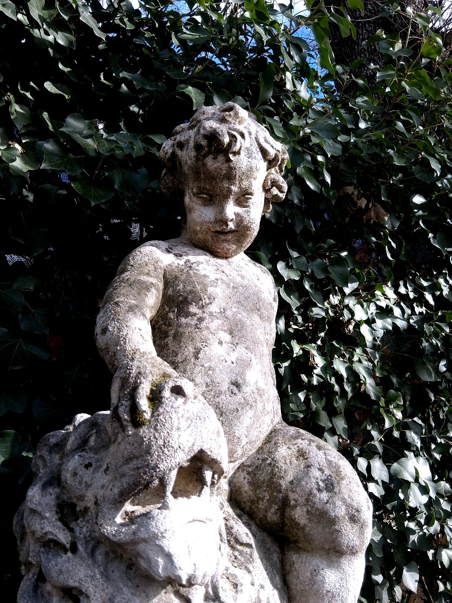 Statue putto au lion-photo-1