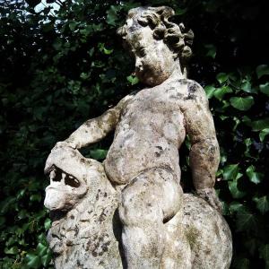 Putto Statue With A Lion