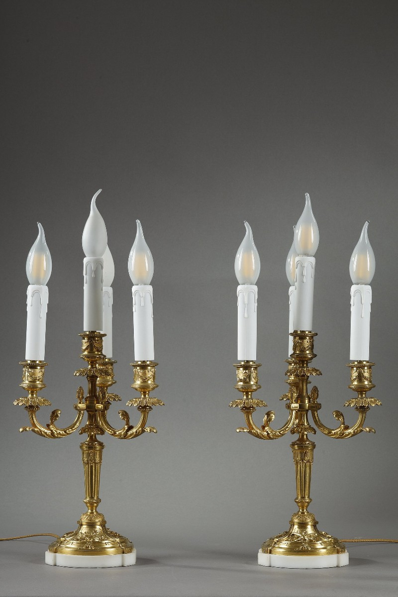 Paire de candélabres en bronze doré de style Louis XVI