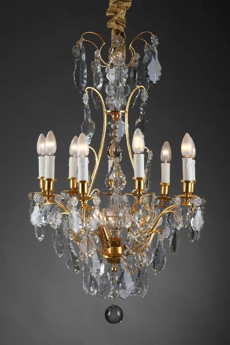 Lustre à huit bras de lumières en bronze doré et pampilles -photo-4