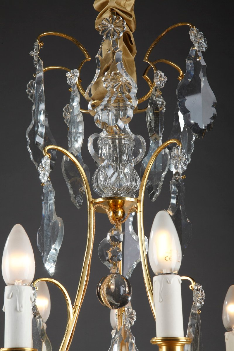 Lustre à huit bras de lumières en bronze doré et pampilles -photo-7