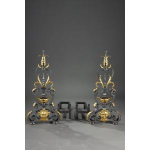Pair Of Wrought Iron Landiers (andirons) With Foliage Decor, Mask And Volutes