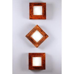 Trois plafonniers ou Appliques en placage de loupe d'orme, Epoque Art déco