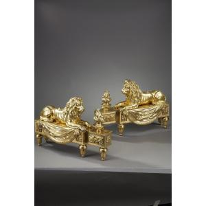 Pair Of Andirons With Lions In Chiseled And Gilded Bronze