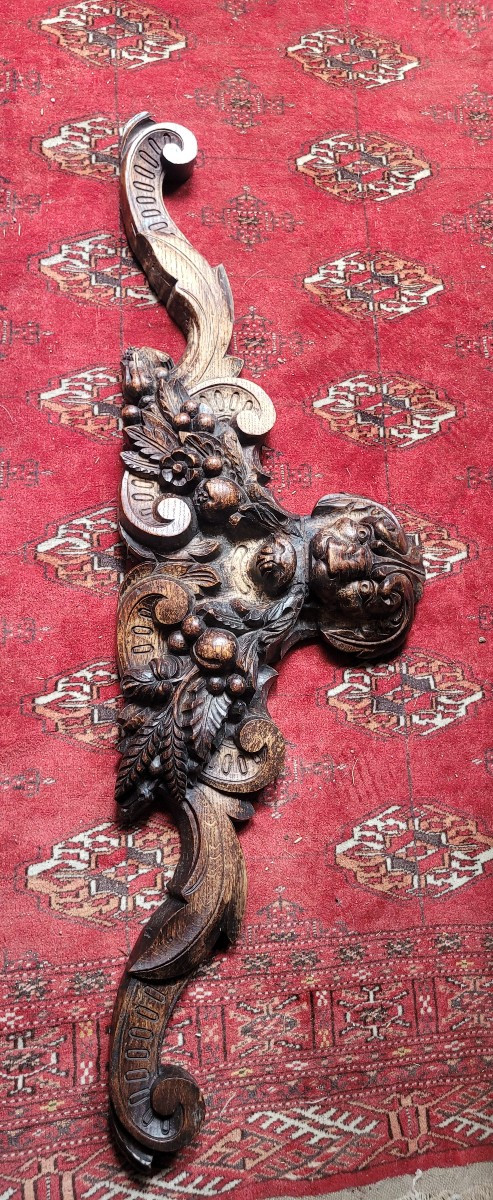 Wooden Frieze With Lion Head Decorations
