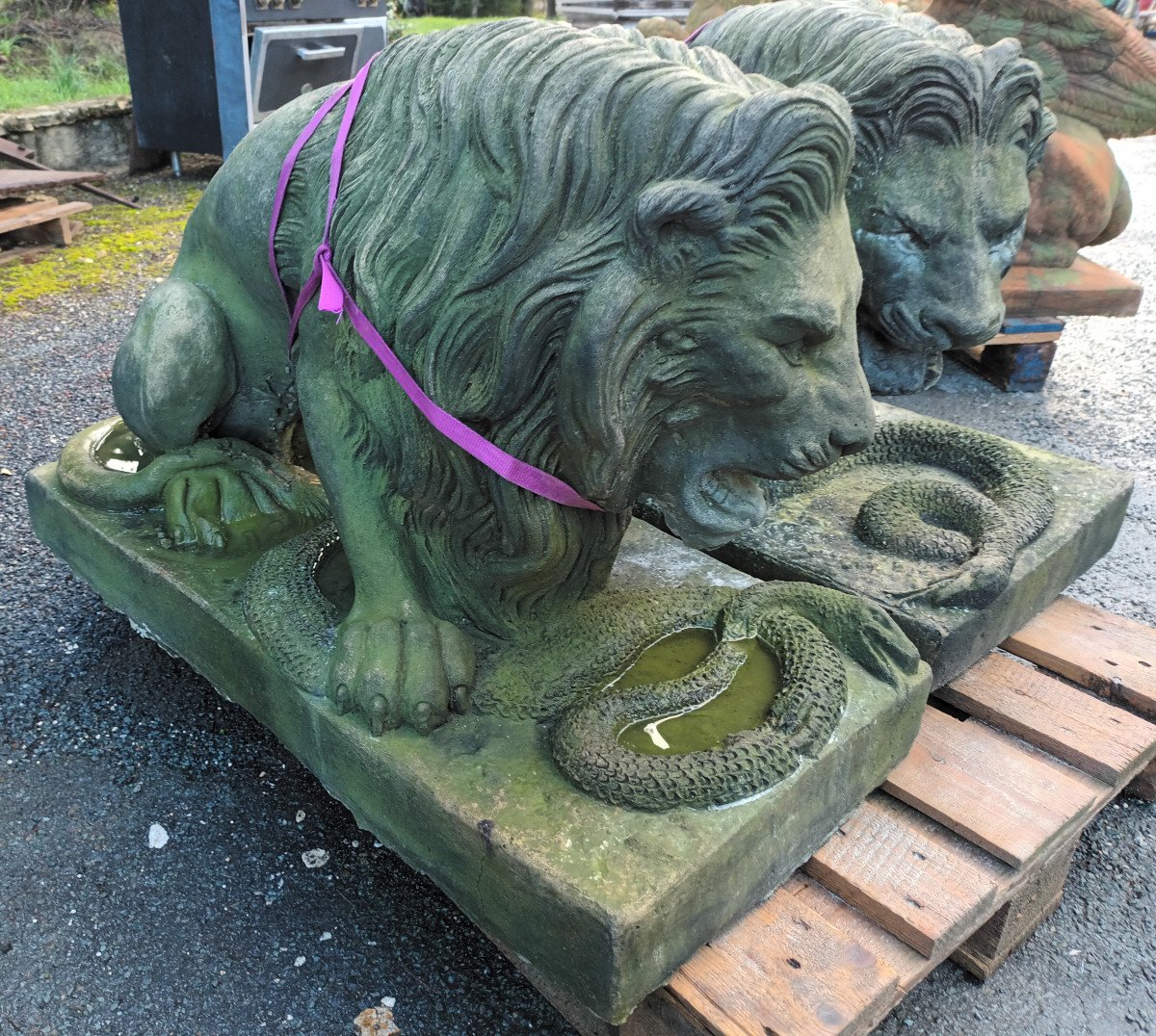 Large Pair Of Lions With Snakes In Cement-photo-1