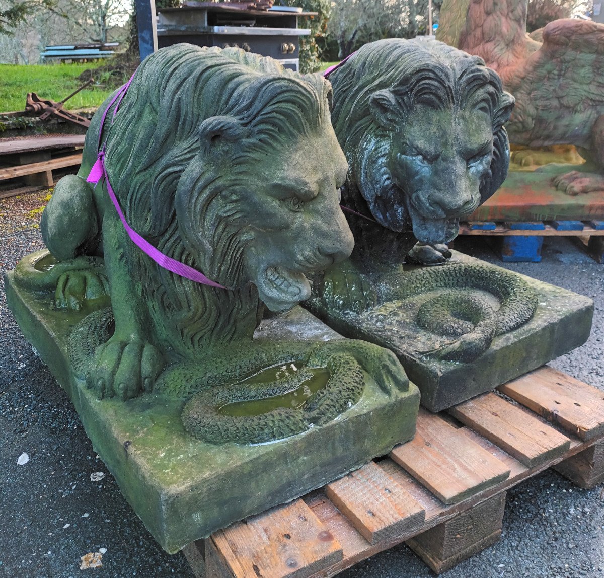 Large Pair Of Lions With Snakes In Cement