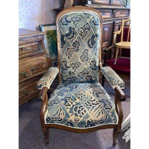 Fauteuil Voltaire en noyer XIXe siècle