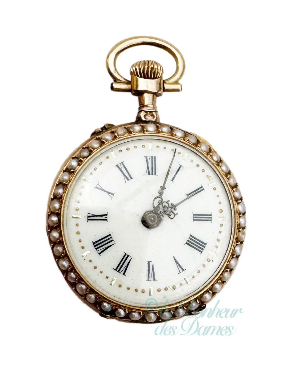 Montre mécanique ancienne  de col à  gousset  femme or massif perles numérotée signée